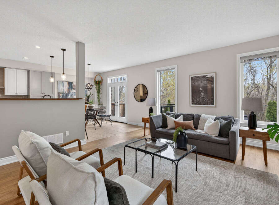 Step into luxury with this stunning property, featuring a spacious living room perfect for entertaining.