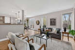 Step into luxury with this stunning property, featuring a spacious living room perfect for entertaining.
