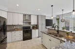 Step into this stunning kitchen, boasting modern design and high-end finishes.