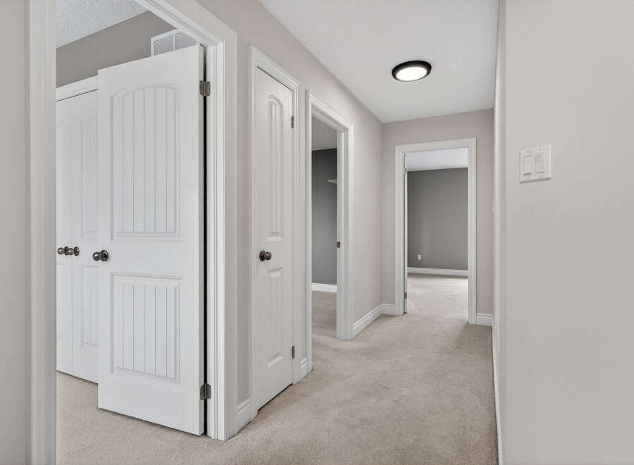 Step into this inviting hallway, showcasing a seamless blend of style and functionality.