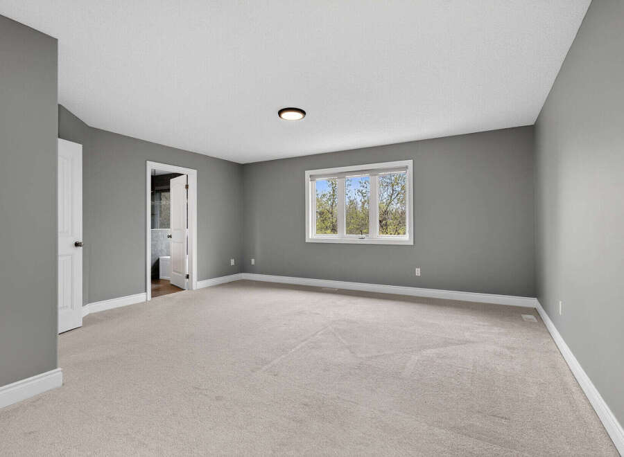 This spacious room offers a blank canvas for your design aspirations.