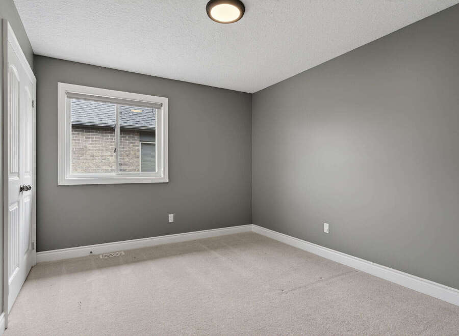 Discover the potential of this inviting room, perfect for a bedroom or home office.