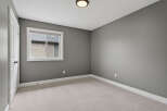 Discover the potential of this inviting room, perfect for a bedroom or home office.