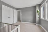 Step into this bright and airy bedroom, featuring a neutral color palette and ample natural light.