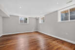 Discover the potential of this inviting space! This room features beautiful hardwood floors, creating a warm and welcoming atmosphere.
