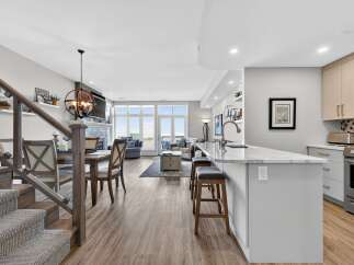 Step into luxury with this stunning property, boasting an open-concept design that seamlessly blends the kitchen, dining, and living areas.