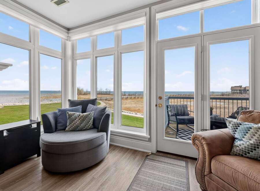 Enjoy breathtaking views from this stunning property! This home features expansive windows that flood the space with natural light and offer panoramic vistas of the surrounding landscape.