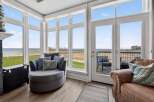 Enjoy breathtaking views from this stunning property! This home features expansive windows that flood the space with natural light and offer panoramic vistas of the surrounding landscape.