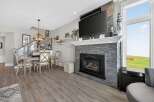 This stunning property boasts a cozy fireplace, perfect for those chilly evenings.