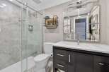 This stunning bathroom boasts a modern design with sleek finishes.