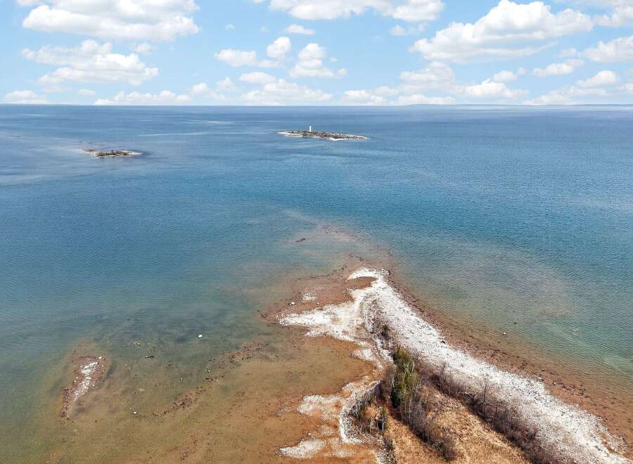 Discover the tranquility of this stunning waterfront property, offering breathtaking views of the open water and surrounding islands.
