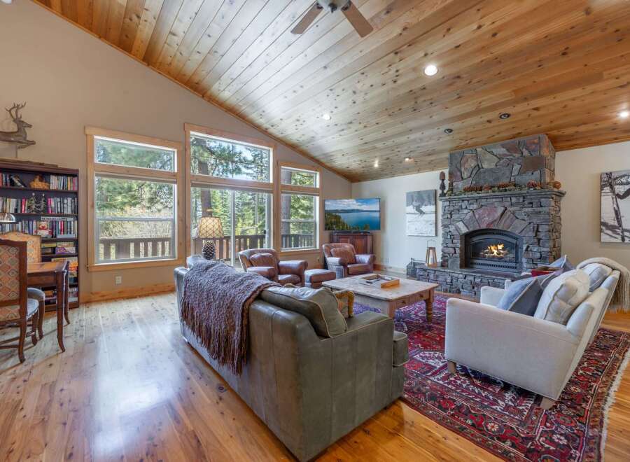 Step into luxury with this stunning living room featuring a cozy fireplace, perfect for those chilly evenings.