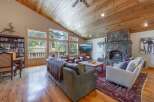 Step into luxury with this stunning living room featuring a cozy fireplace, perfect for those chilly evenings.