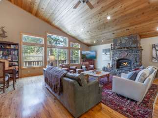 Step into luxury with this stunning living room featuring a cozy fireplace, perfect for those chilly evenings.