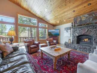 Experience luxury living in this stunning property featuring a cozy fireplace, perfect for chilly evenings.