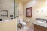 Step into a beautifully designed bathroom featuring a glass-enclosed shower and elegant tile work.