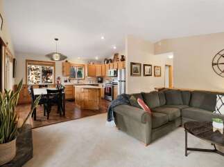 This stunning property boasts a spacious open-concept living area, perfect for entertaining.