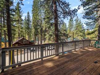 Enjoy breathtaking views from this stunning deck! This property features a spacious deck, perfect for relaxing and entertaining.
