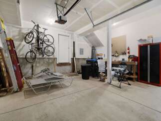 This spacious garage offers ample storage and functionality.