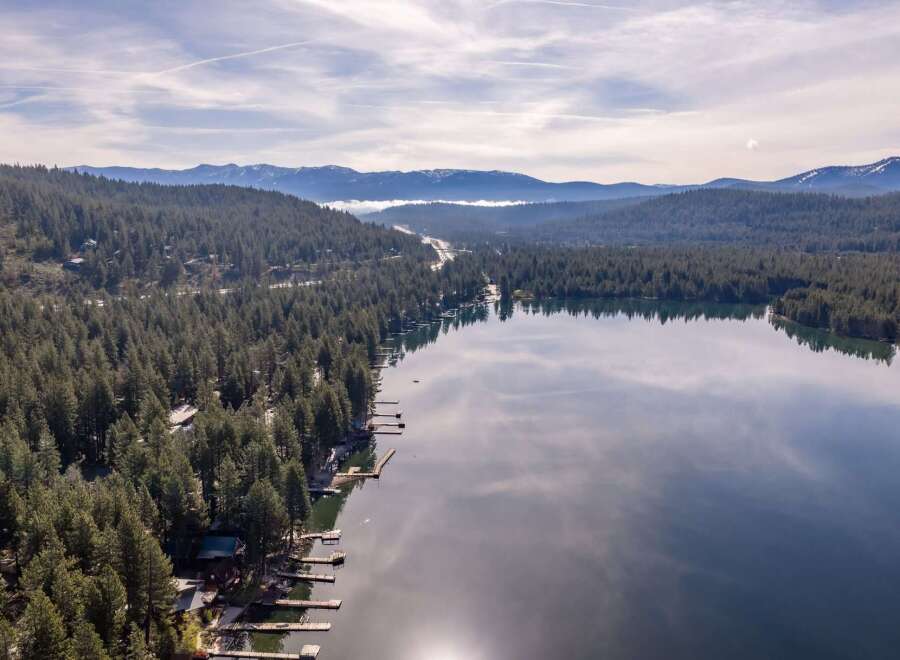 Discover the tranquility of lakeside living with this stunning property.