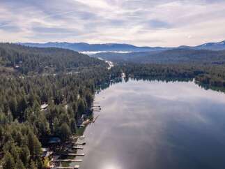 Discover the tranquility of lakeside living with this stunning property.