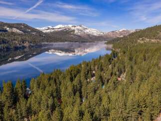Discover the tranquility of lakeside living with this stunning property.
