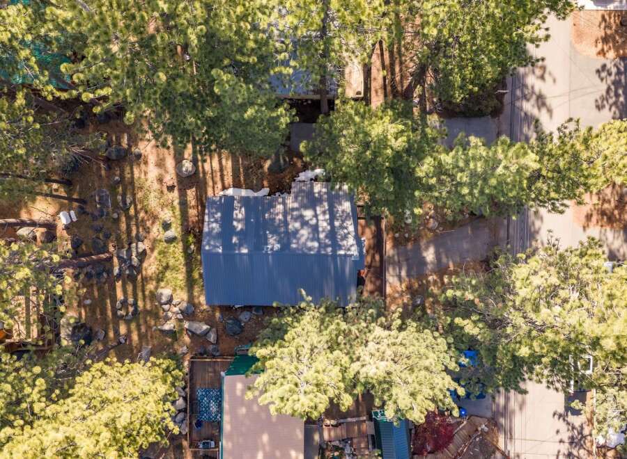 Discover a charming property nestled amidst lush greenery, perfect for those seeking tranquility.