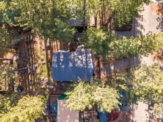 Discover a charming property nestled amidst lush greenery, perfect for those seeking tranquility.