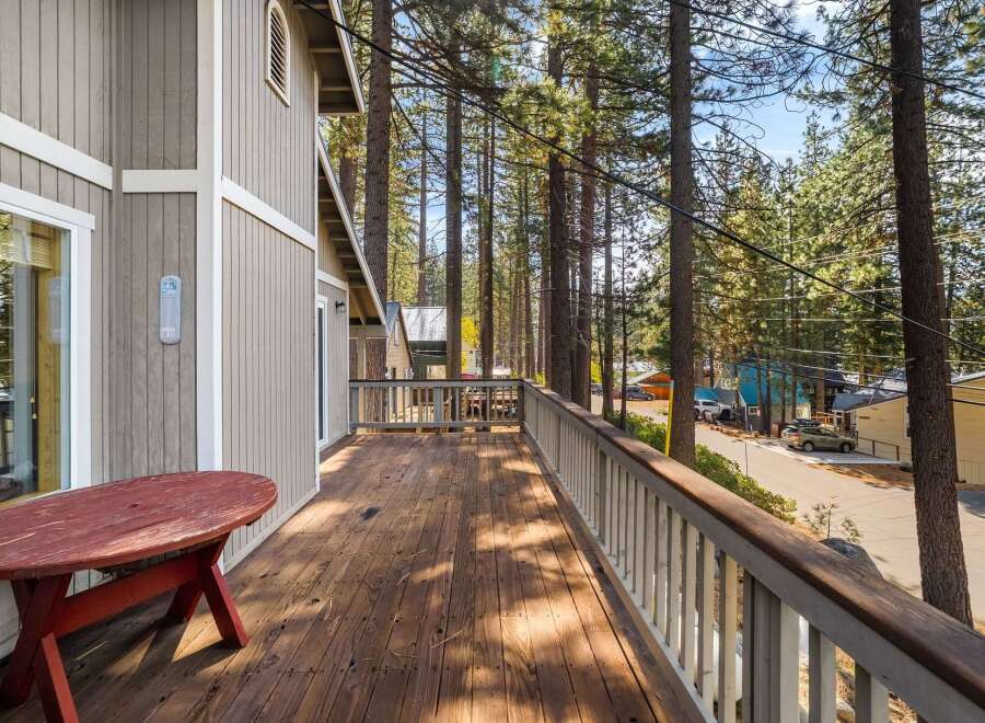 Enjoy stunning views from this charming cabin's expansive deck, perfect for morning coffee or evening relaxation.