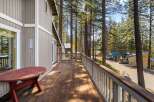 Enjoy stunning views from this charming cabin's expansive deck, perfect for morning coffee or evening relaxation.