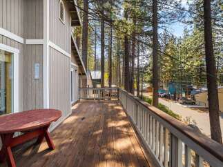 Enjoy stunning views from this charming cabin's expansive deck, perfect for morning coffee or evening relaxation.