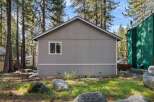Nestled in a serene, wooded setting, this charming property offers a tranquil escape.