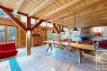 Experience the charm of this stunning property, featuring a beautifully designed interior with exposed wooden beams and a cozy fireplace.