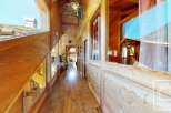 Step into a world of rustic charm with this stunning wooden interior.