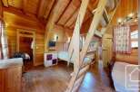 Discover the charm of this cozy wooden cabin, perfect for a mountain getaway.
