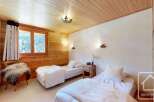 Discover the charm of this cozy bedroom, perfect for a relaxing getaway.