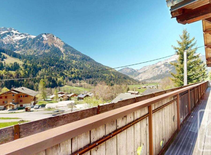 Enjoy breathtaking mountain views from this charming property.