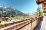 Enjoy breathtaking mountain views from this charming property.