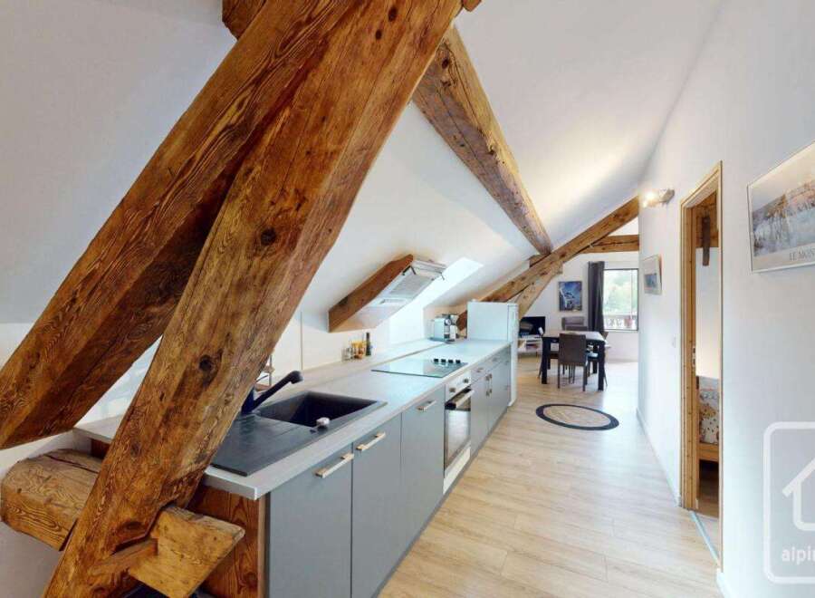 Discover this charming property featuring a modern kitchen with sleek cabinetry and appliances.