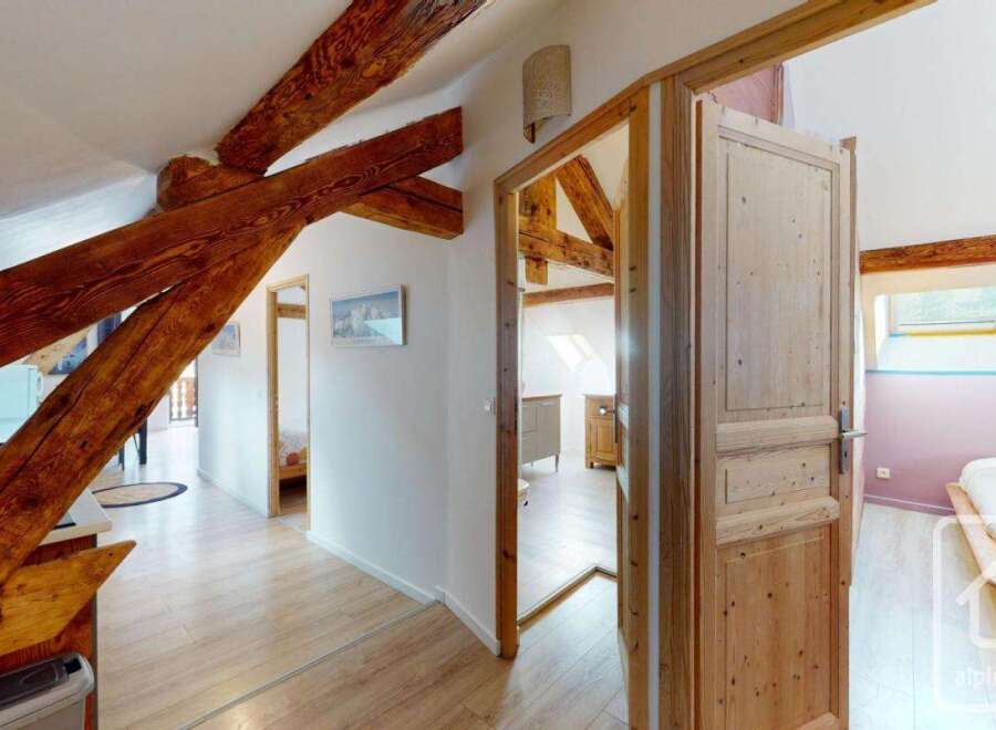 Discover the charm of this stunning property, featuring exposed wooden beams that add character and warmth.