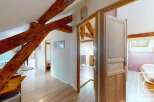 Discover the charm of this stunning property, featuring exposed wooden beams that add character and warmth.