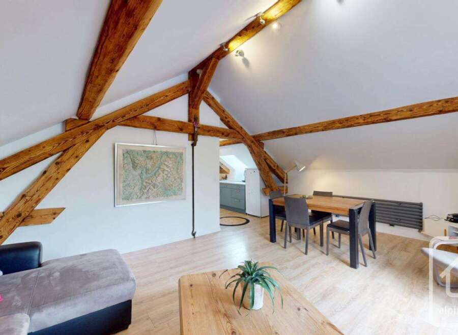 Discover this stunning property featuring exposed wooden beams, creating a warm and inviting atmosphere.