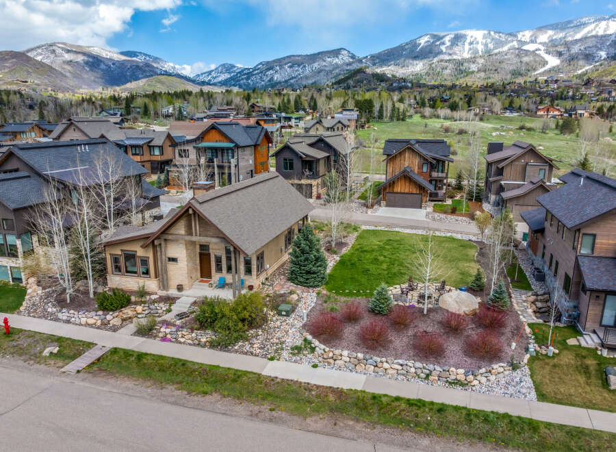Nestled in a picturesque mountain setting, this stunning property boasts exquisite architectural details and a warm, inviting ambiance.
