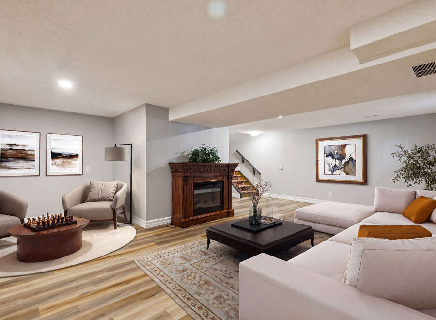 Step into luxury with this stunning living space, featuring a cozy fireplace and elegant artwork.