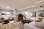 Step into luxury with this stunning living space, featuring a cozy fireplace and elegant artwork.