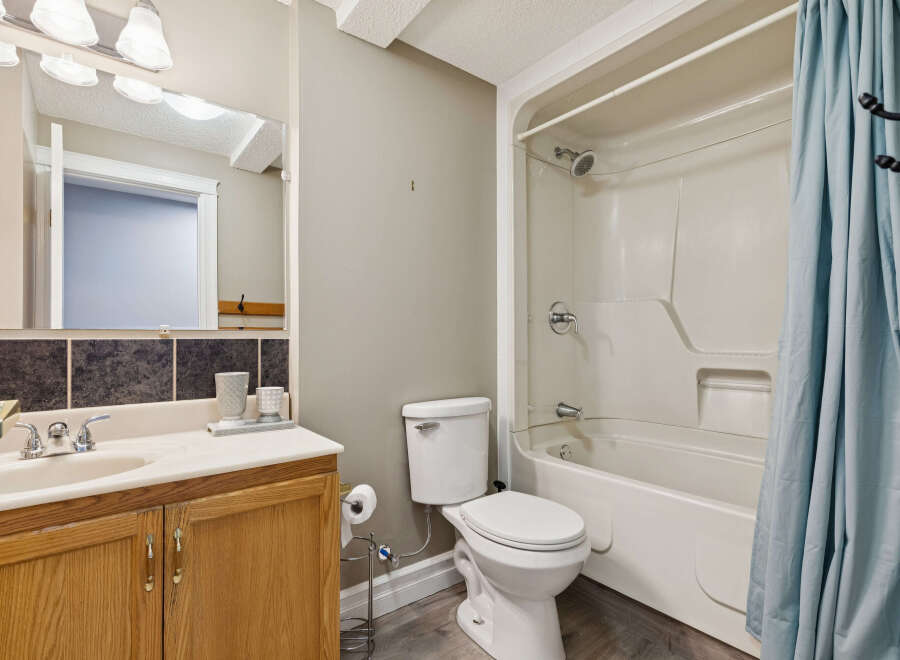 This bathroom features a clean and functional design, perfect for everyday use.
