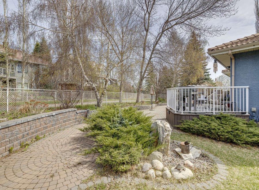 This stunning property boasts a beautifully landscaped backyard, perfect for outdoor entertaining and relaxation.