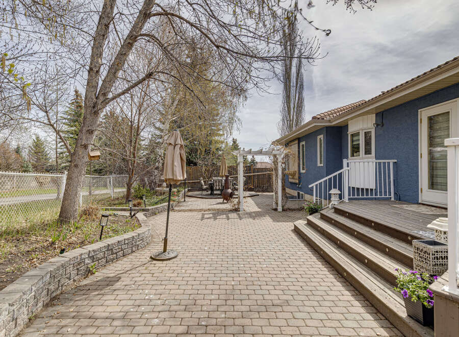 Enjoy outdoor living in this stunning property! This home features a beautiful brick patio, perfect for entertaining or relaxing.