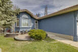 This stunning property boasts a beautifully landscaped front yard, perfect for curb appeal.