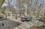 Enjoy outdoor living at its finest with this stunning property featuring a beautifully designed patio and deck.
